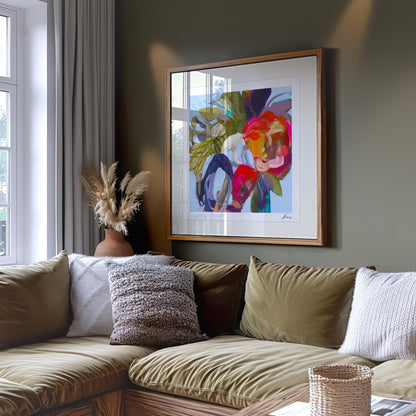 Living room with a sectional sofa, decorative pillows, and a colorful abstract painting on the wall.