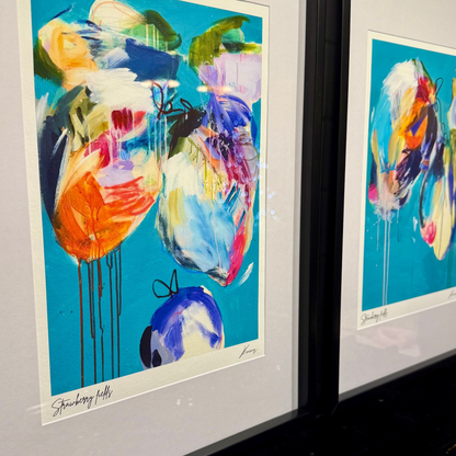 Framed art prints in a black frame