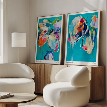 Modern living room with white chairs, a wooden table, and colorful abstract paintings on the wall.