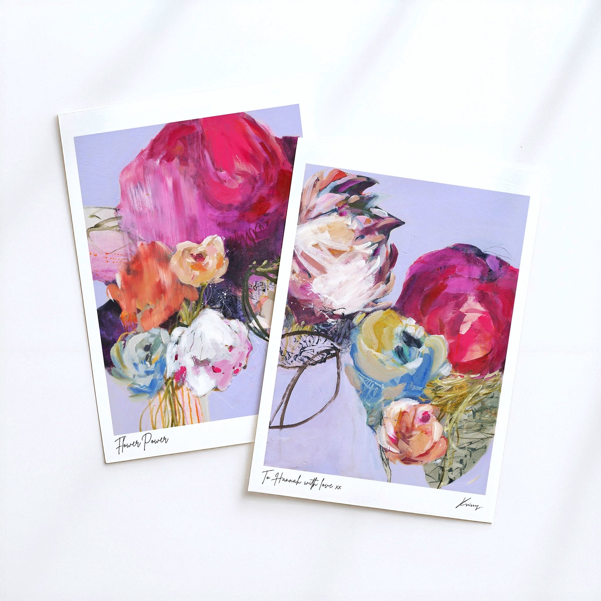Two floral greeting cards with vibrant colors on a white background