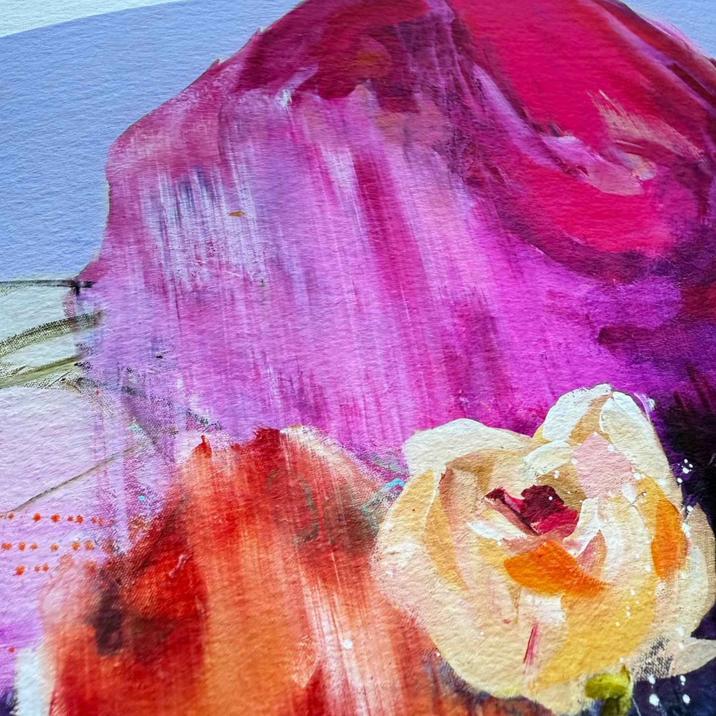 Close-up of a painting with a pink and red abstract background and a white flower.