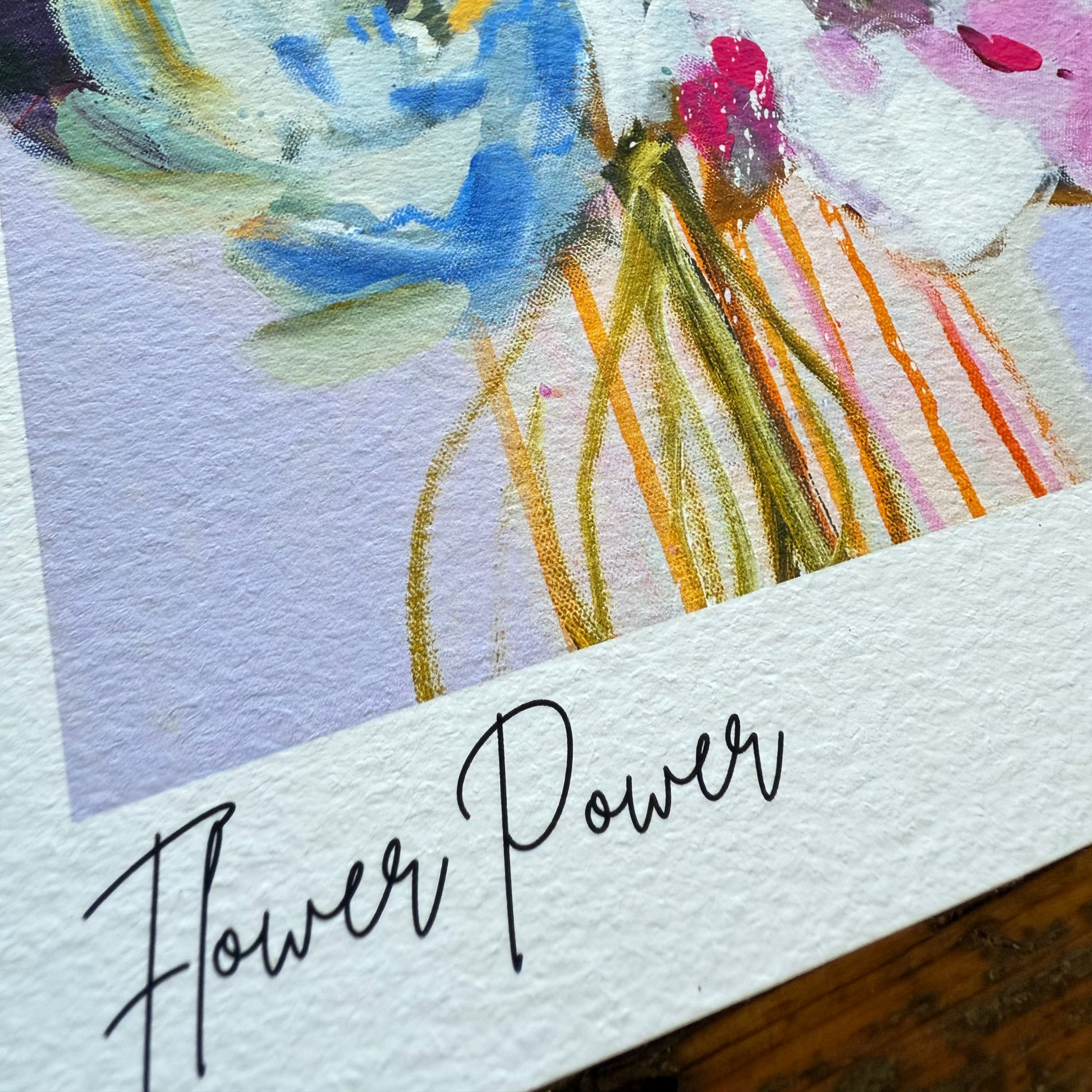 Artistic depiction of flowers with 'Flower Power' text on a textured surface