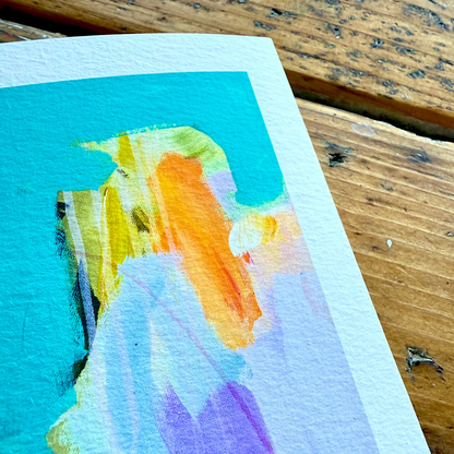 Colorful abstract painting on a wooden surface