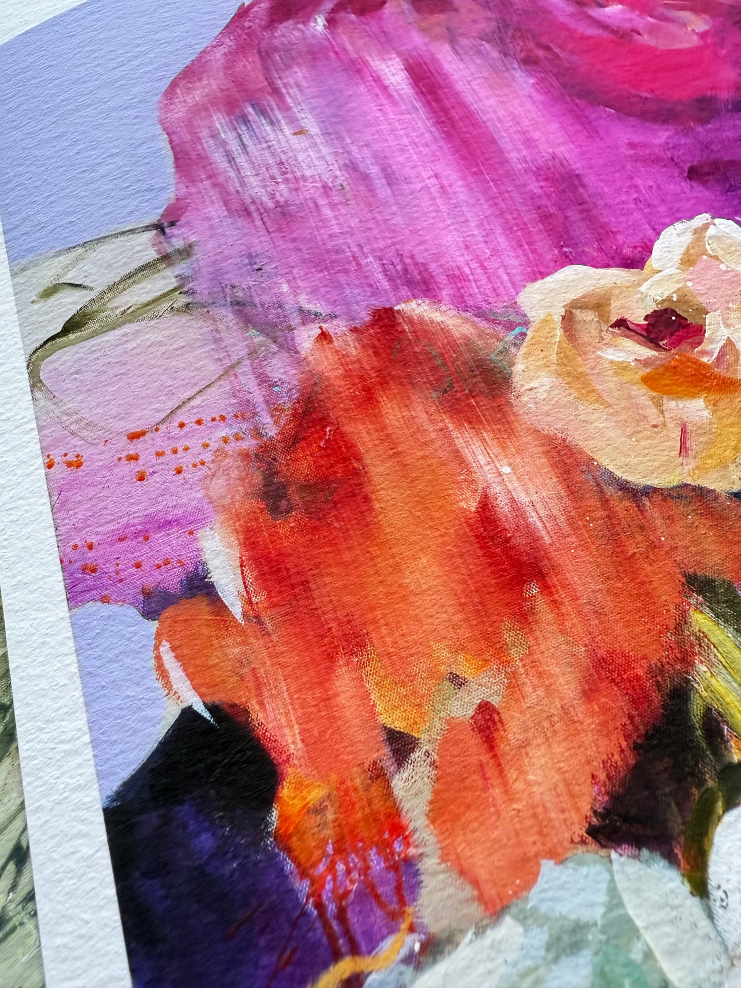 Close-up of a colorful floral painting with vibrant pink, red, and orange hues.